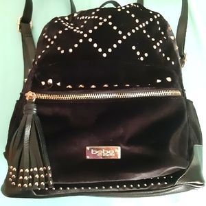 Bebe black velvet mini backpack with gold accents
